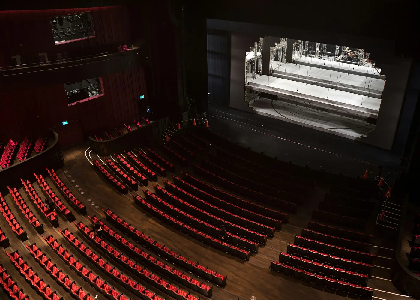 Red seats in an empty auditorium